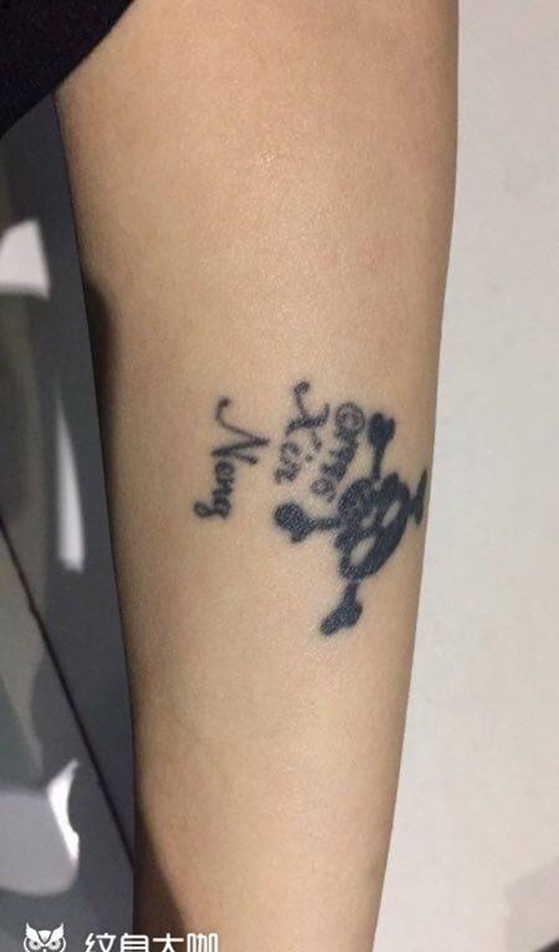 羽毛遮盖纹身图片