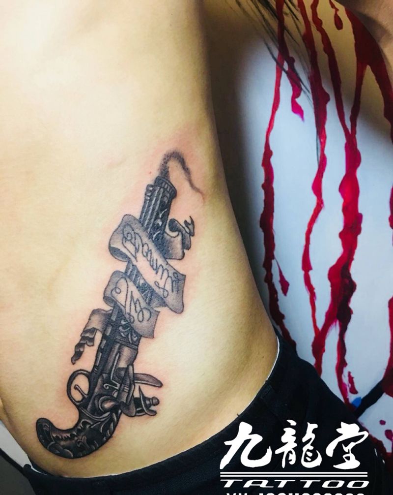 枪纹身图片