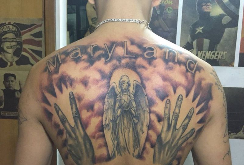 客人要求纹个篮球天使加号数纹身图片