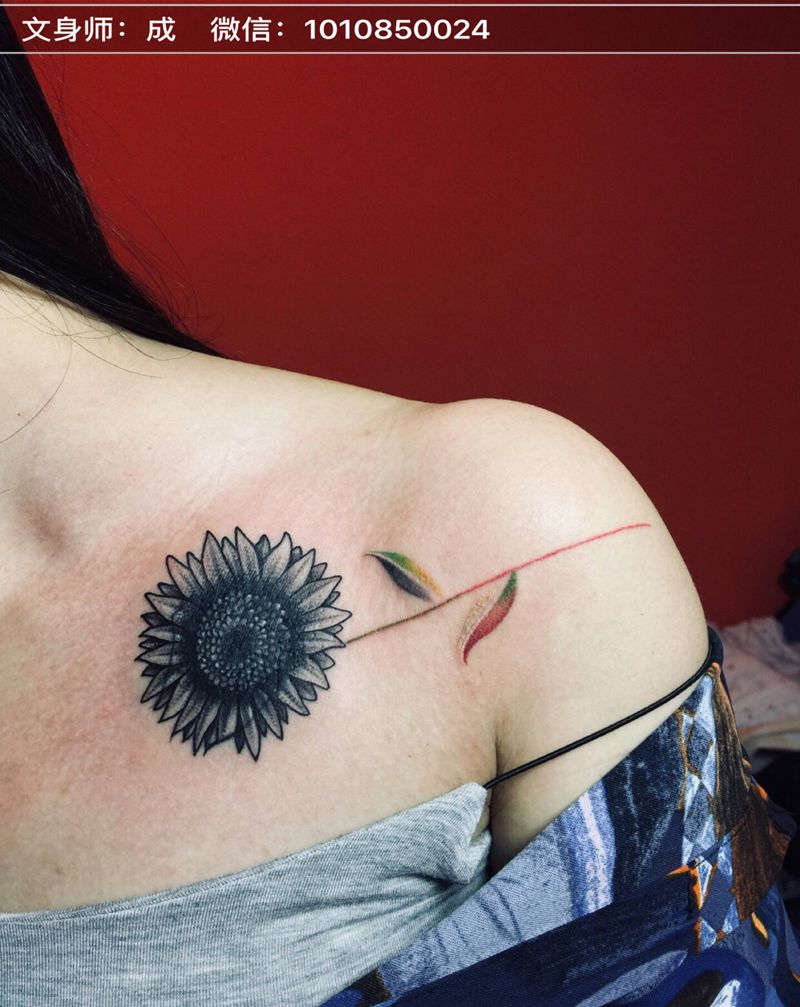 向日葵遮盖纹身图片
