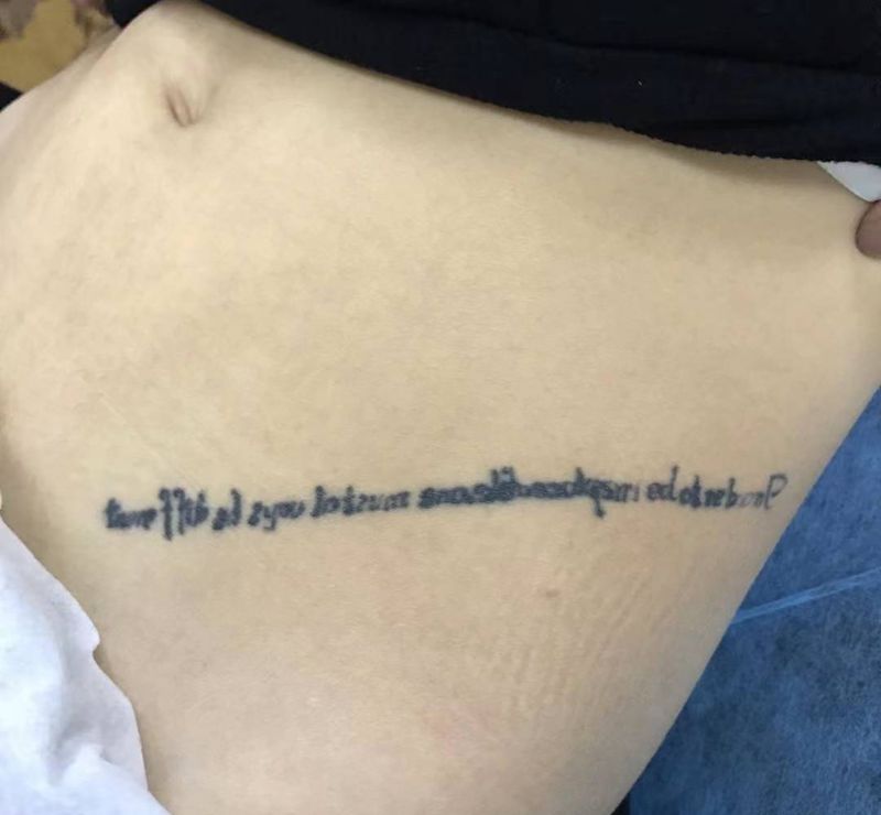 皮秒洗纹身图片_腹部老传统纹身图案