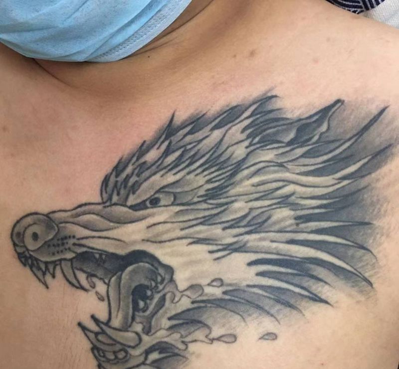 皮秒洗纹身纹身图片_胸部纹身图案