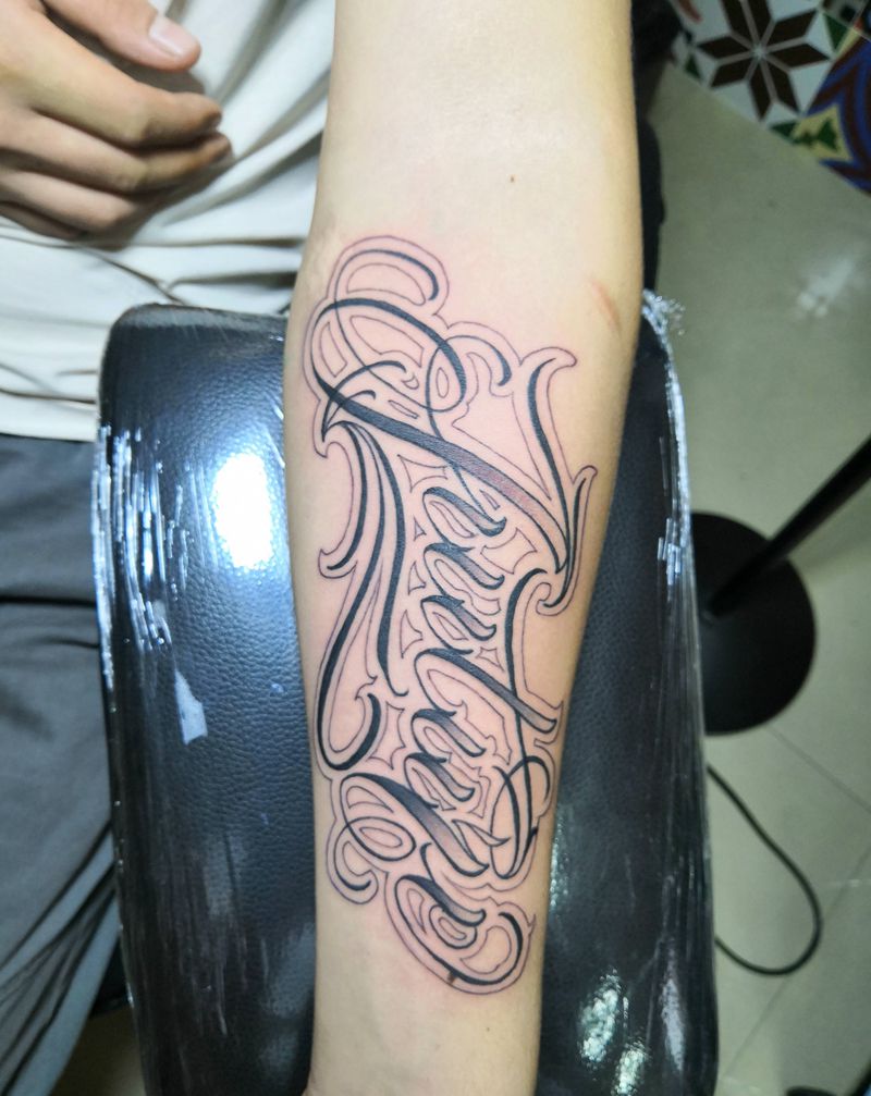 花体字。纹身图片_手臂花体字纹身图案