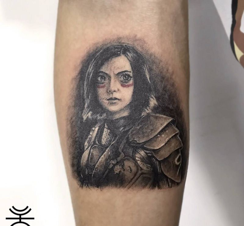 阿丽塔纹身图片_手臂欧美写实纹身图案