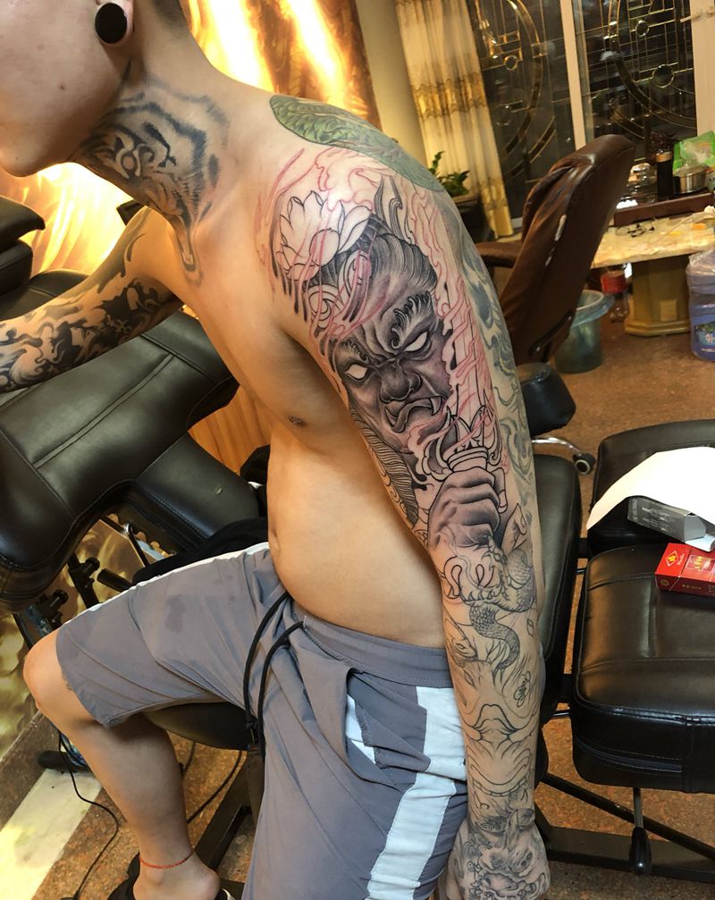 不动明王纹身图片_手臂纹身图案