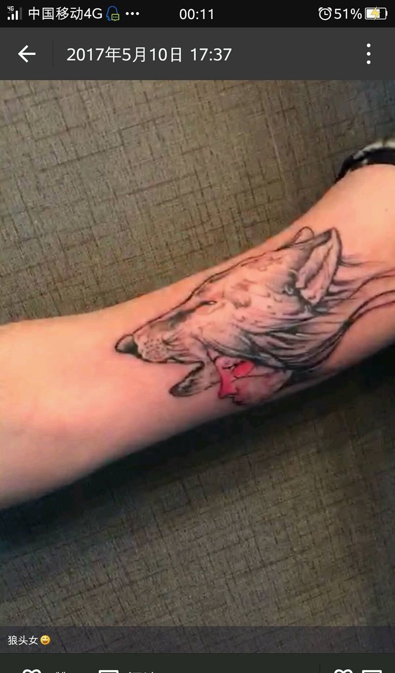 狼头女。纹身图片