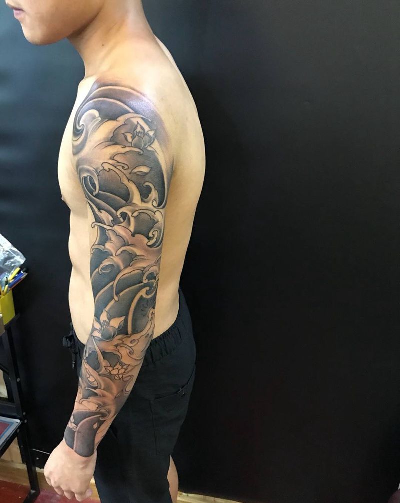 浪臂纹身图片