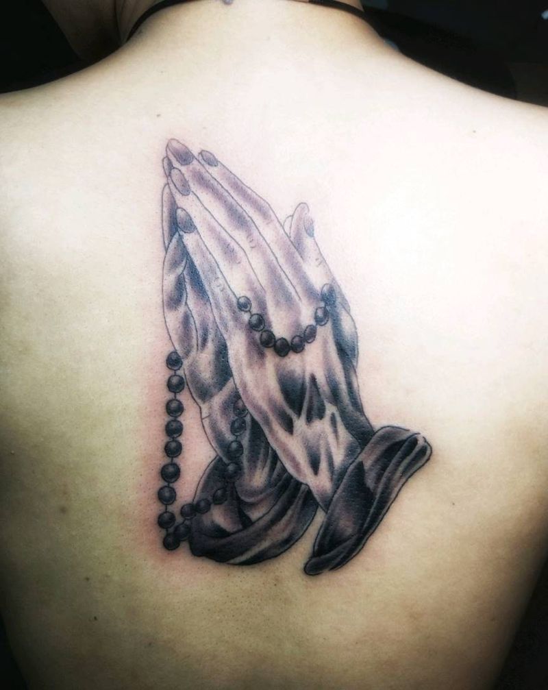 祈祷之手。纹身图片