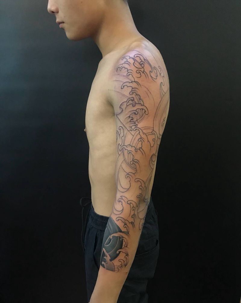 七分浪臂纹身图片