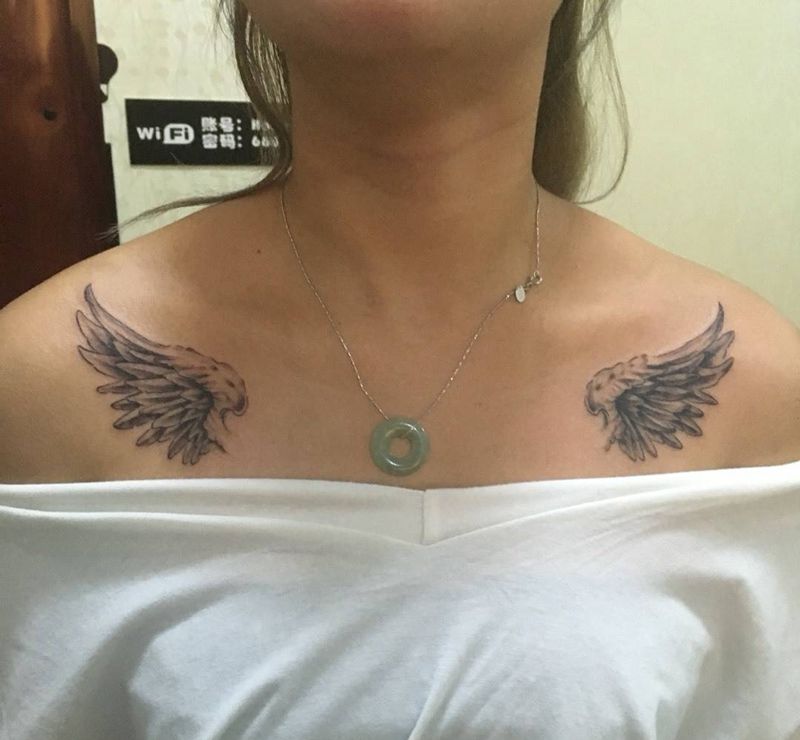 翅膀恢复后纹身图片