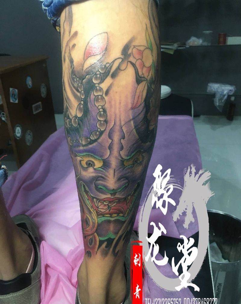 般若纹身图片_成品腿部传统鬼神纹身图案