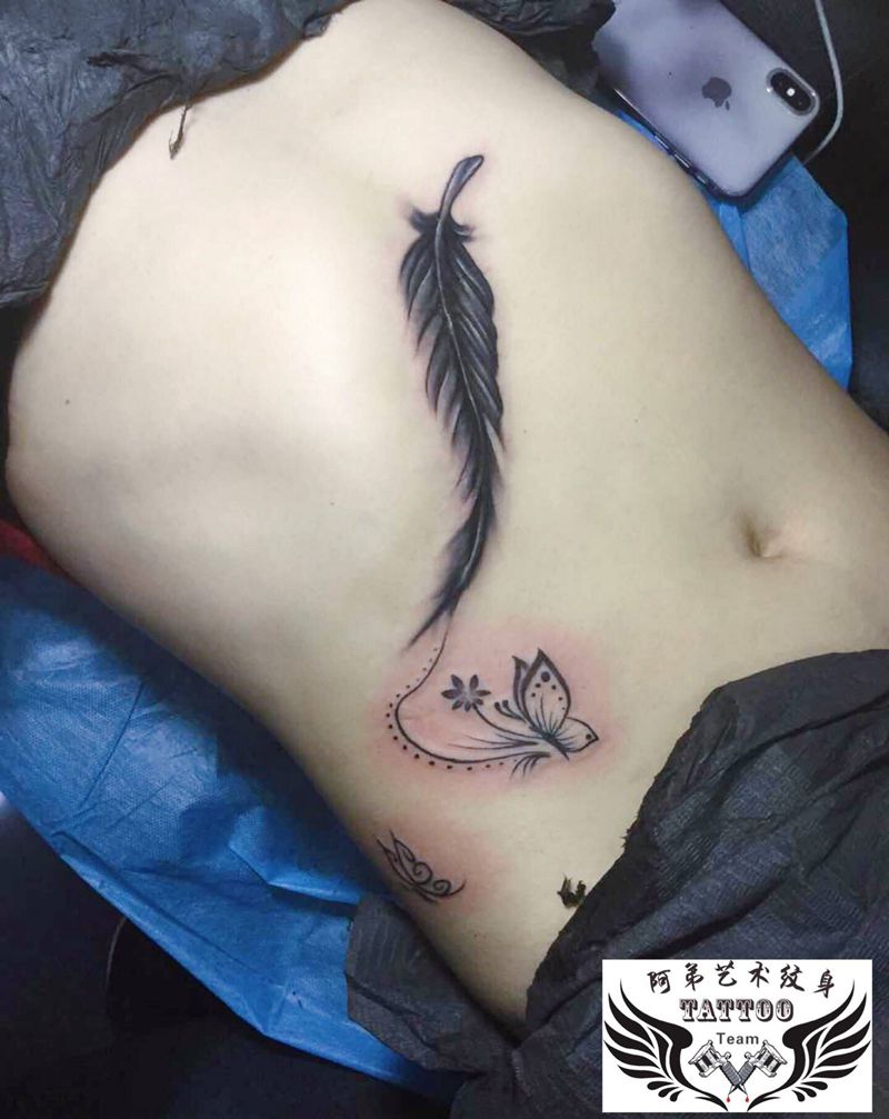 羽毛纹身图片_腹部纹身图案
