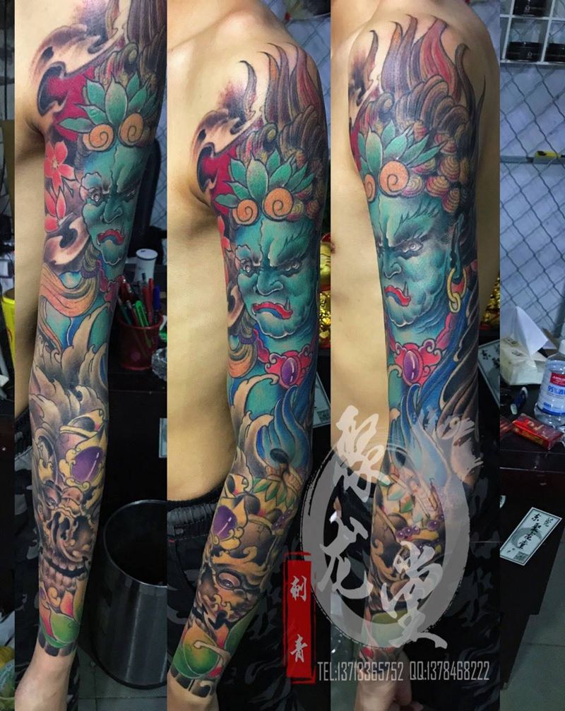 不动明王和嘎巴拉花臂纹身图片