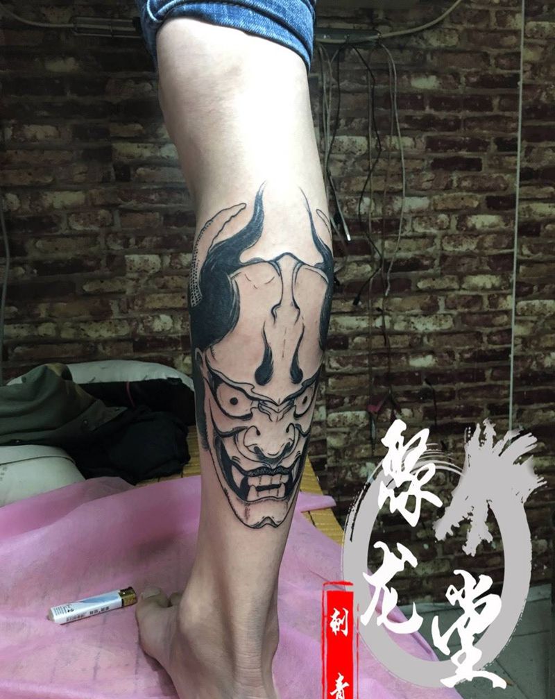 般若纹身图片_成品腿部传统鬼神纹身图案