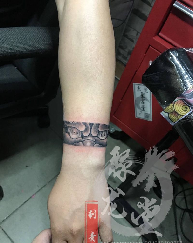 唐狮臂环纹身图片_成品原创纹身图案