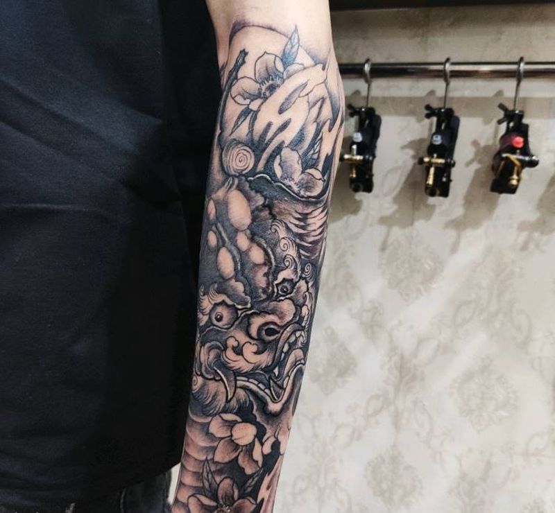 唐狮纹身图片_手臂新传统唐狮纹身图案