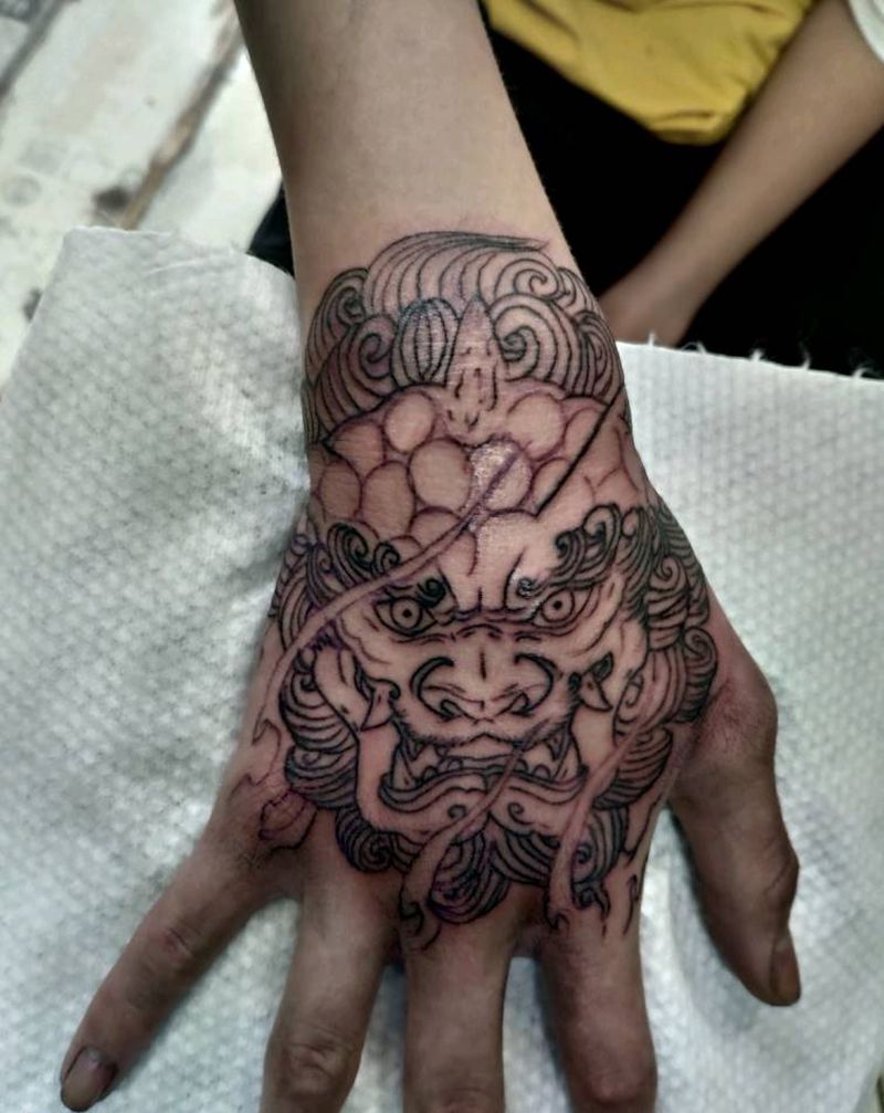 唐狮纹身图片_手部新传统纹身图案