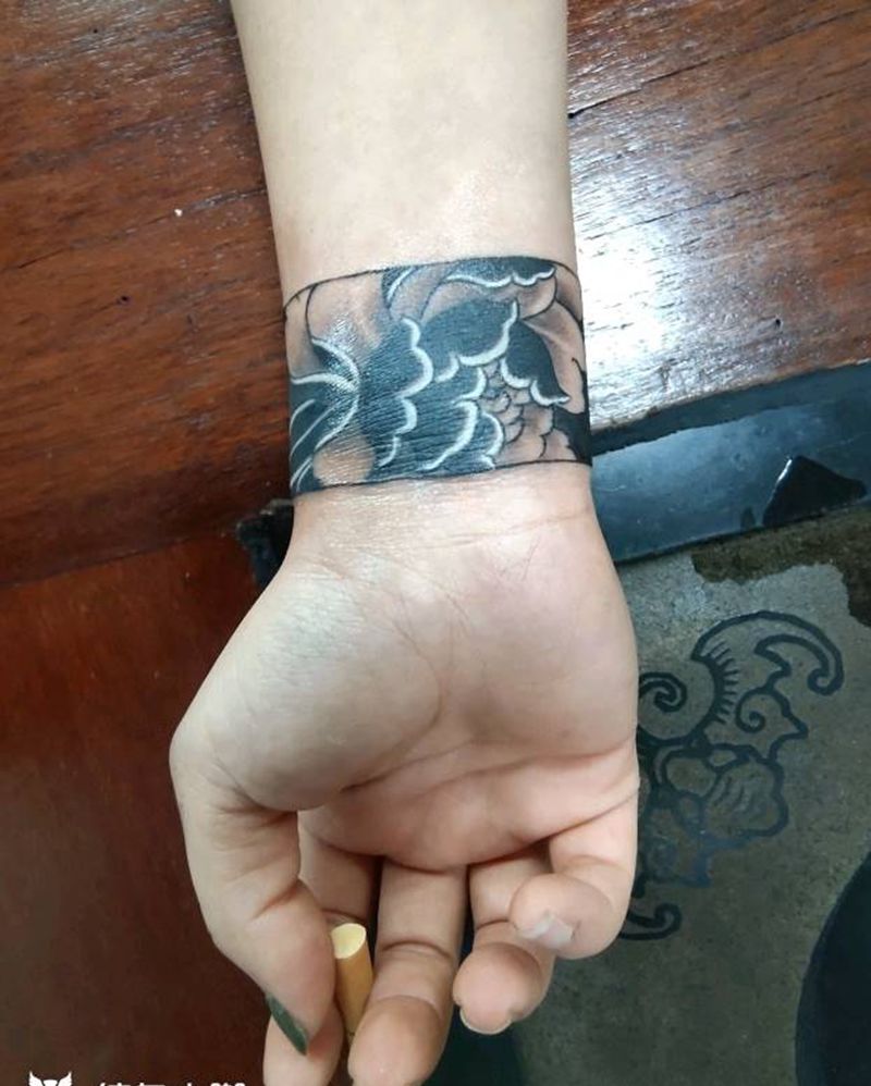 手环纹身图片_手臂老传统牡丹纹身图案