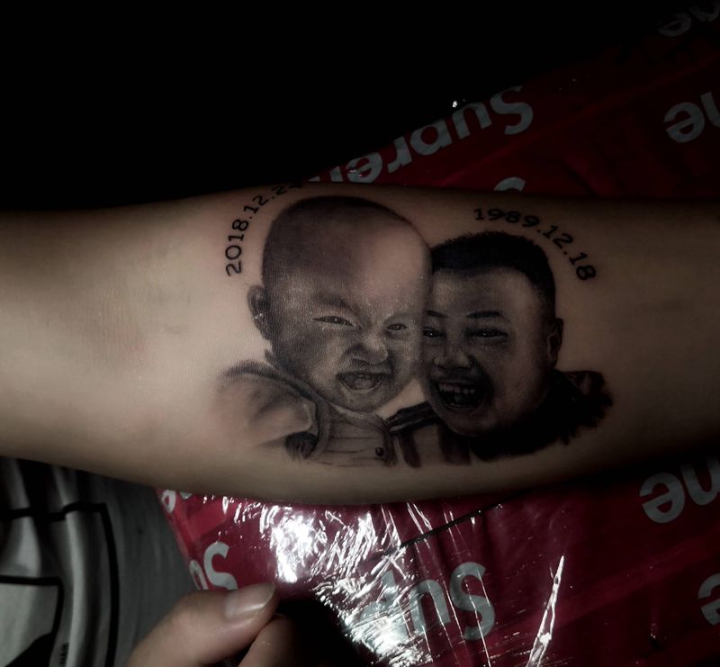 父子纹身图片_手臂欧美写实纹身图案