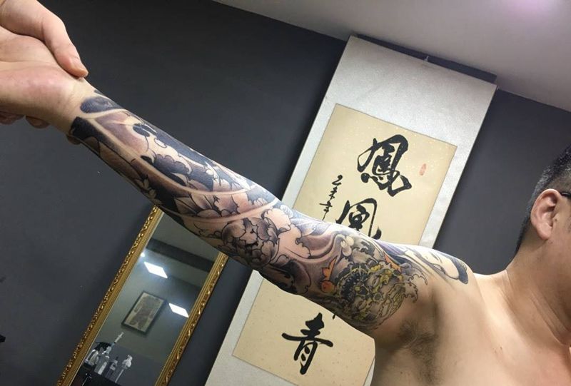 花臂为完成纹身图片