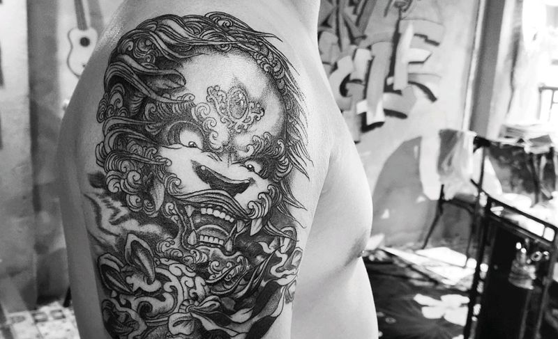 唐狮纹身图片_手臂老传统纹身图案