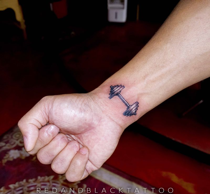 健身纹身图片_手臂欧美写实纹身图案