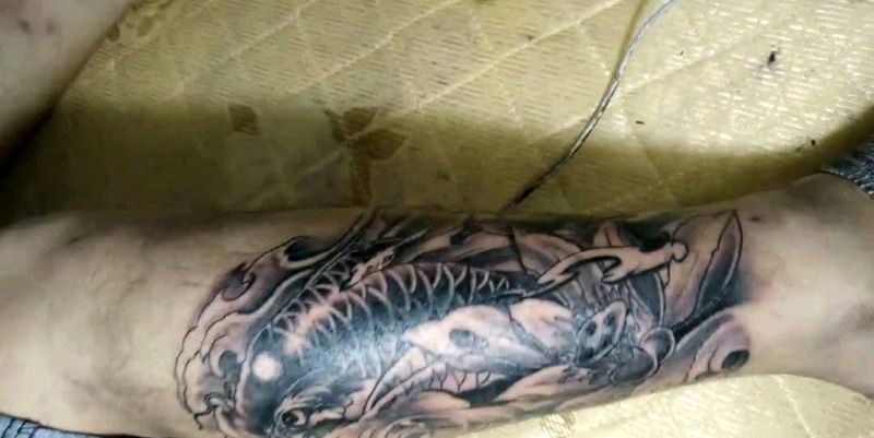 近期招财鱼纹身图片