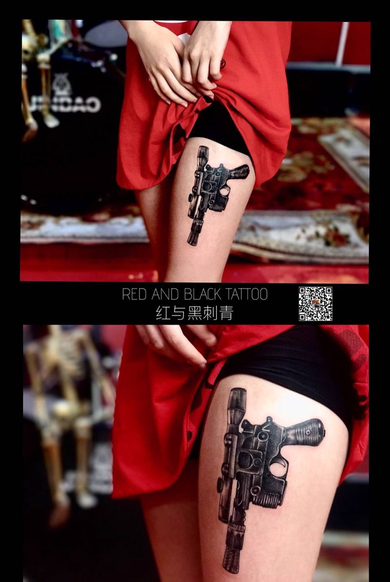 腿上藏着一把枪纹身图片