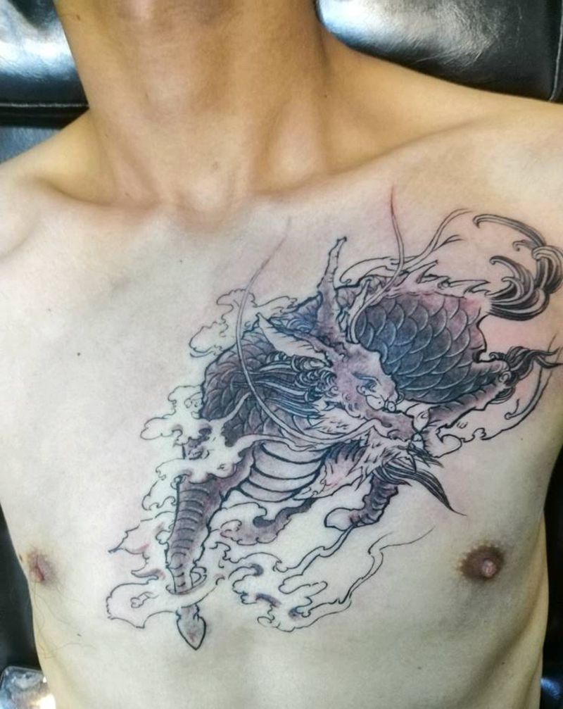 胸口麒麟纹身图片_胸部新传统纹身图案