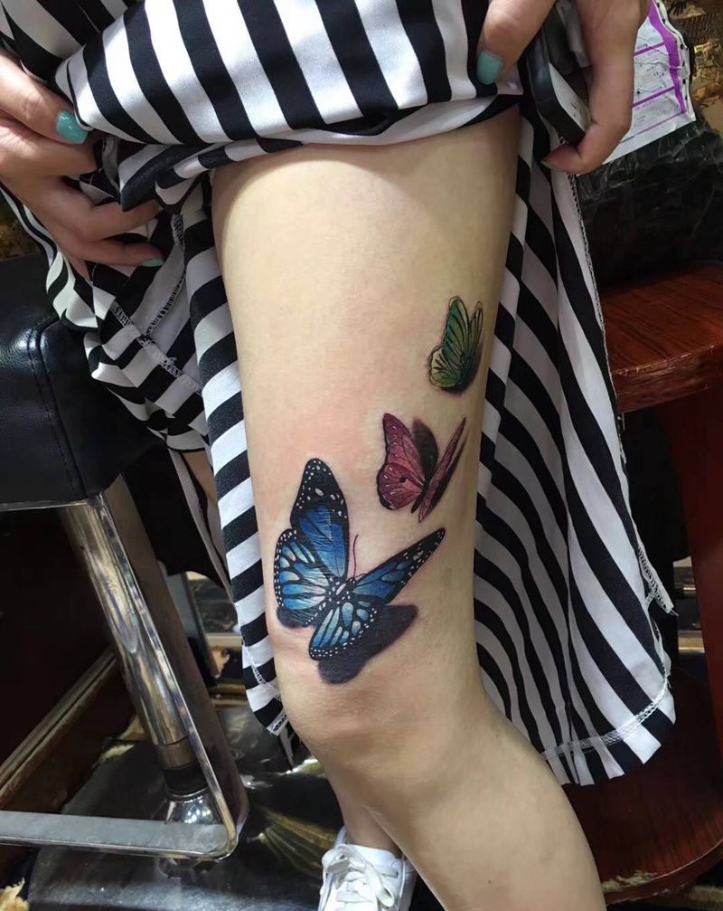 盖疤蝴蝶纹身图片_腿部纹身图案