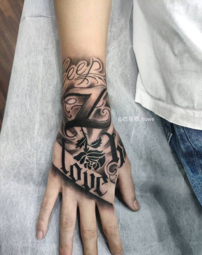 手背花体纹身图片_手臂花体字纹身图案
