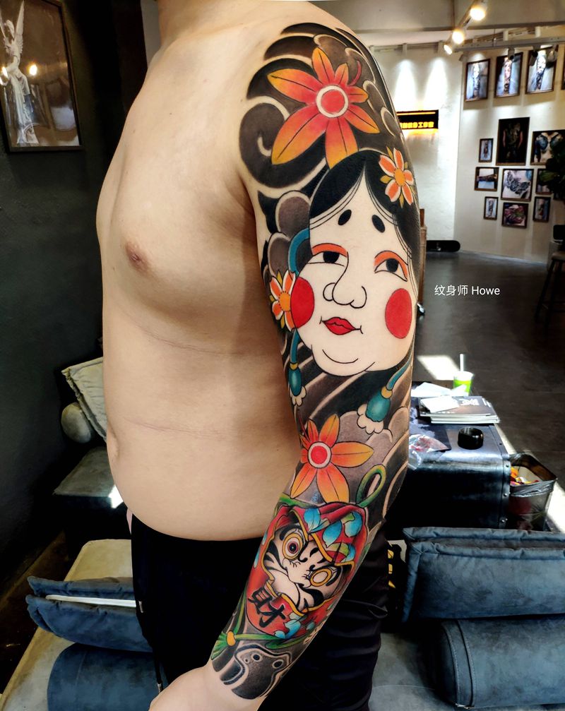 阿多福和达摩蛋纹身图片_手臂老传统纹身图案