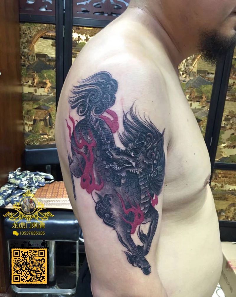 招财麒麟纹身图片_手臂纹身图案