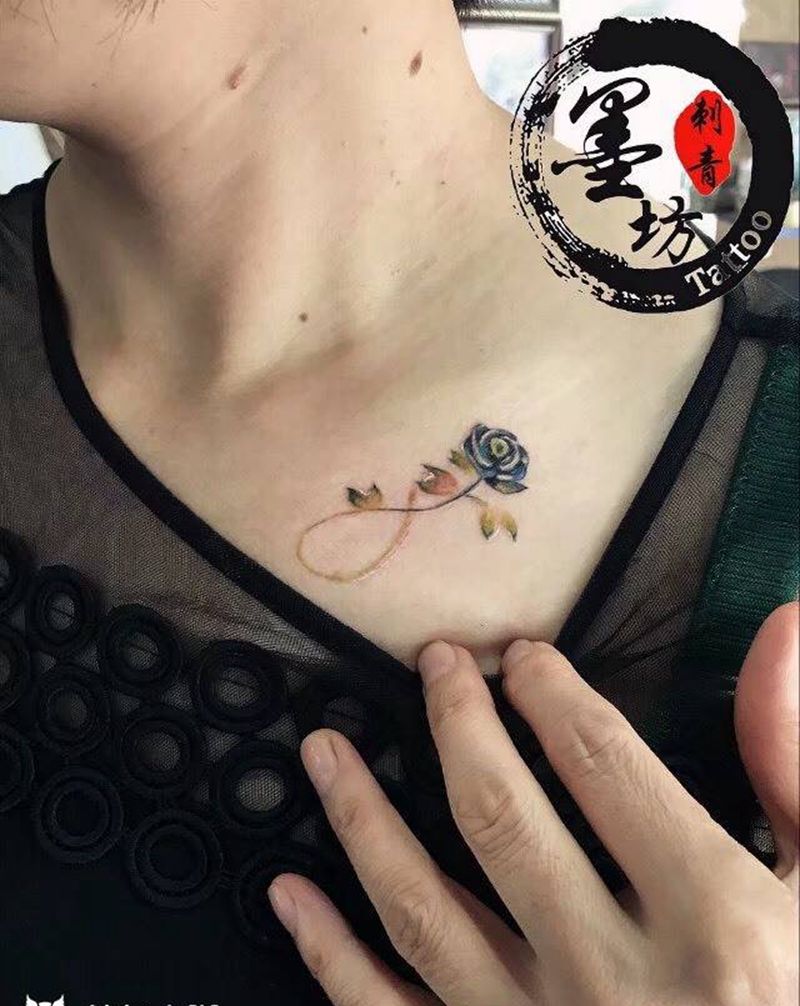 花纹身图片_成品颈部清新植物纹身图案