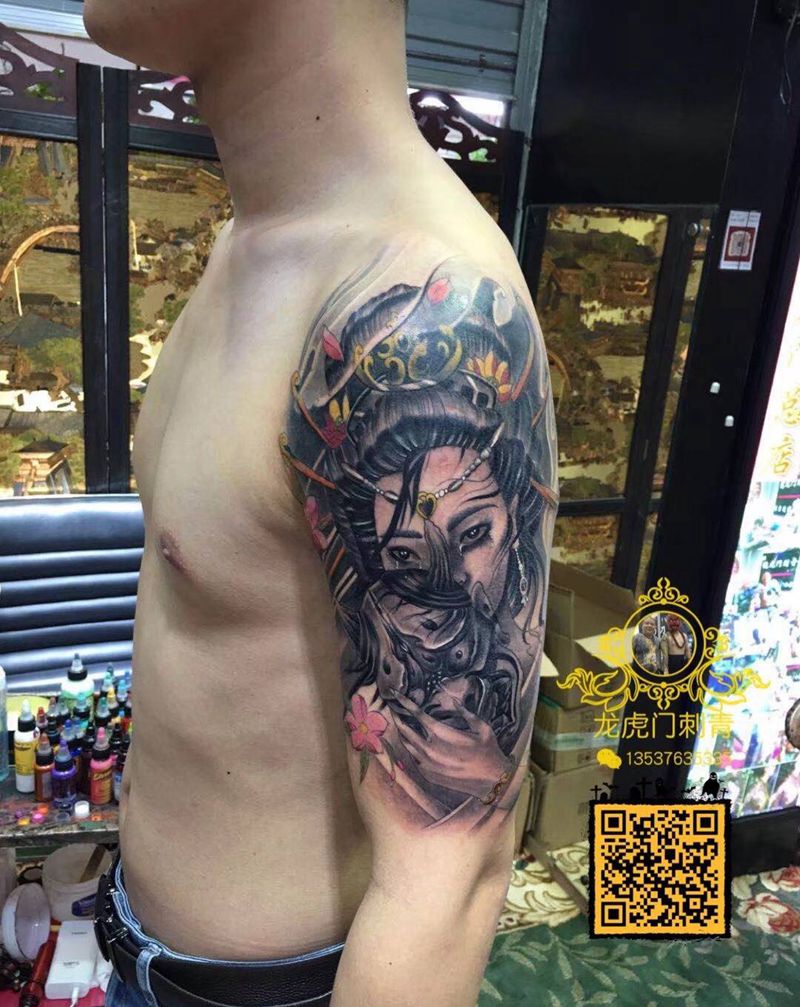 包大臂纹身图片_手臂纹身图案