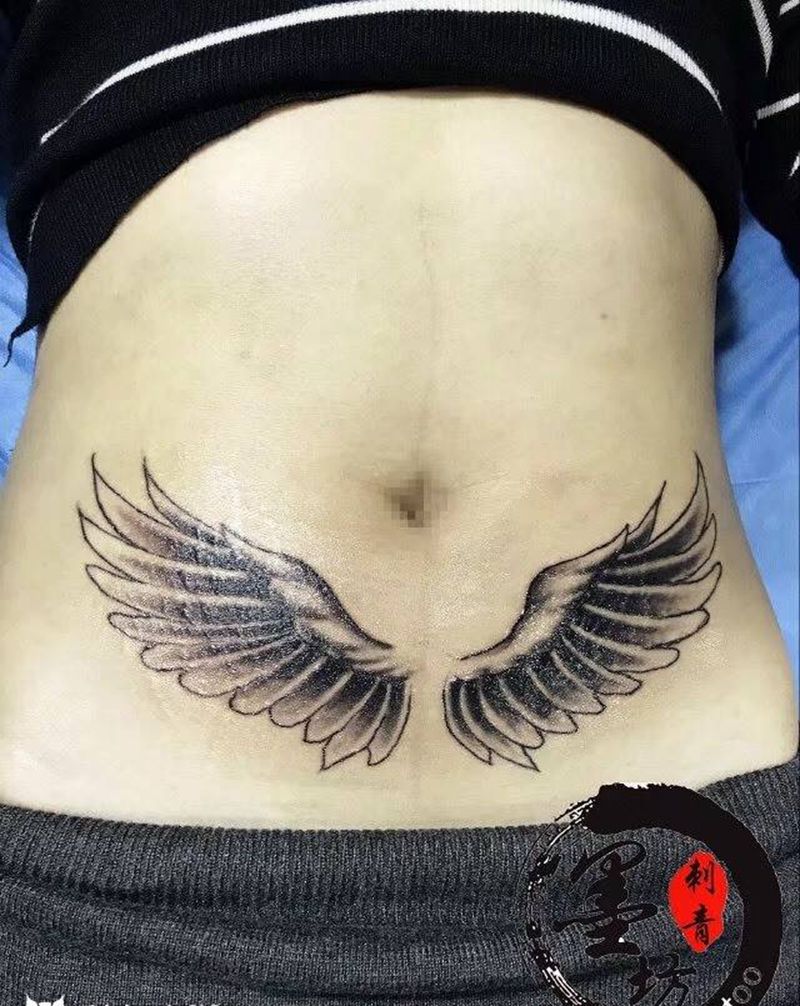 翅膀纹身图片_成品腹部传统原创纹身图案