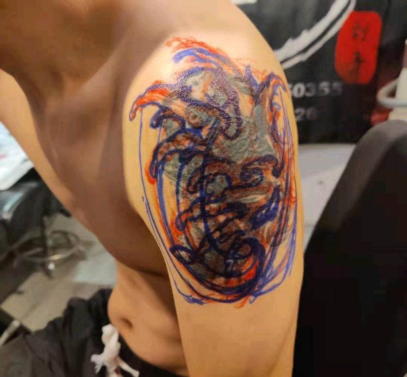 浪花遮盖纹身图片_手臂纹身图案