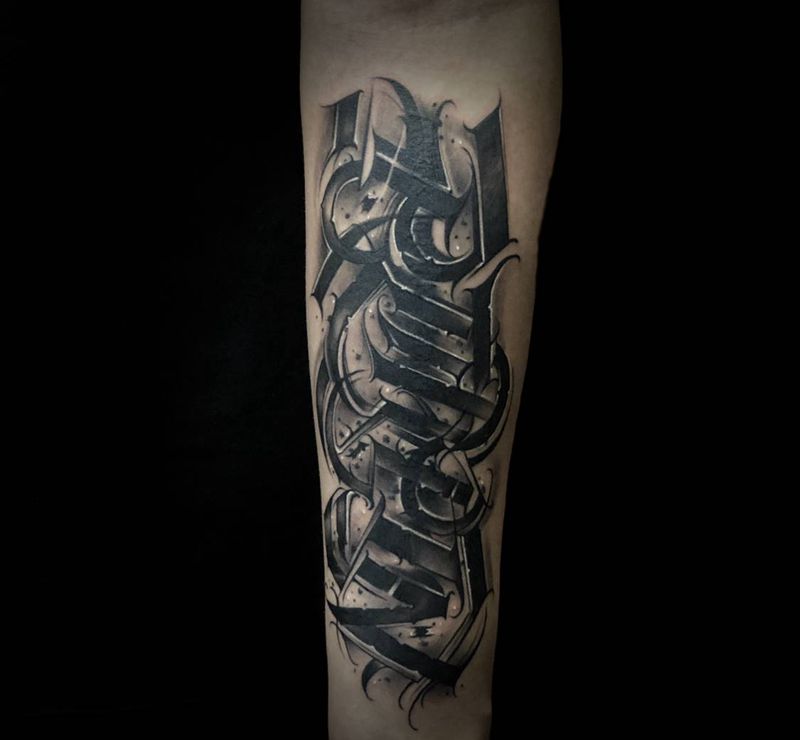 字体遮盖纹身图片_手臂花体字纹身图案