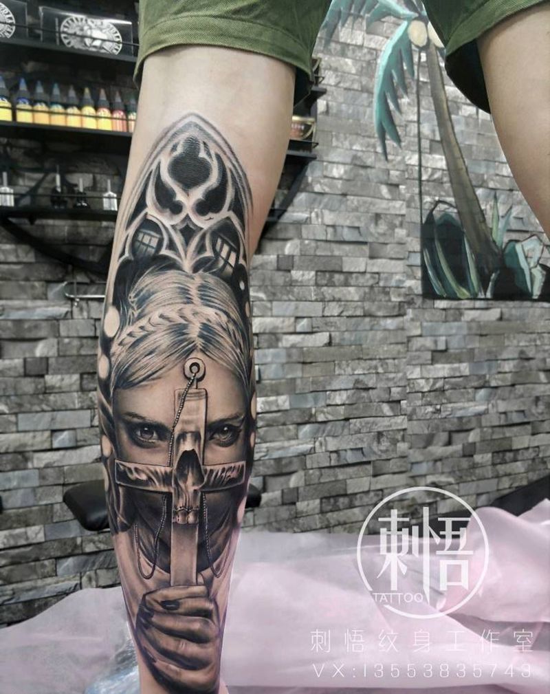 修女纹身图片_腿部欧美写实纹身图案
