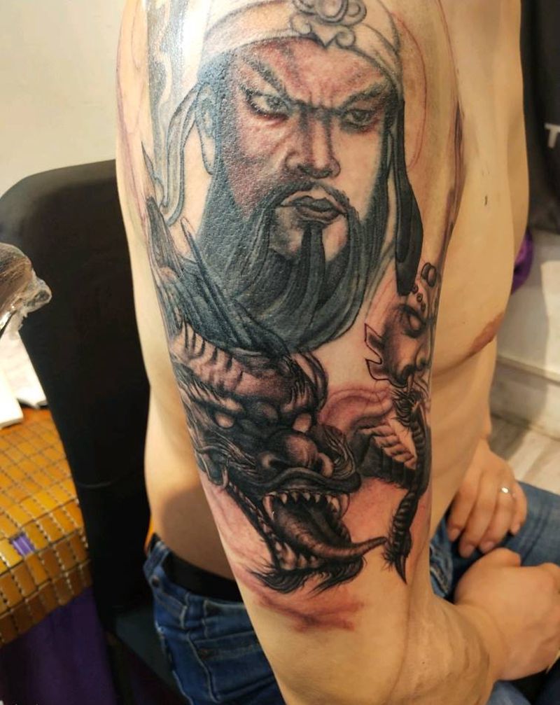 关公盘龙纹身图片_手臂纹身图案
