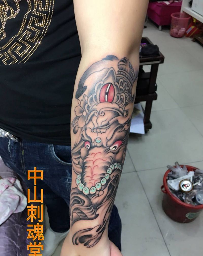 小手臂象神纹身图片