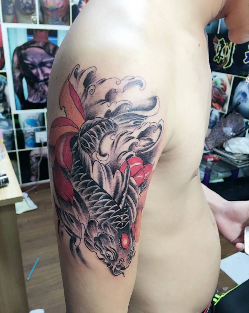 手臂鲤鱼纹身图片