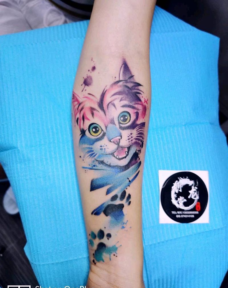 水彩纹身图片_手臂水彩纹身图案