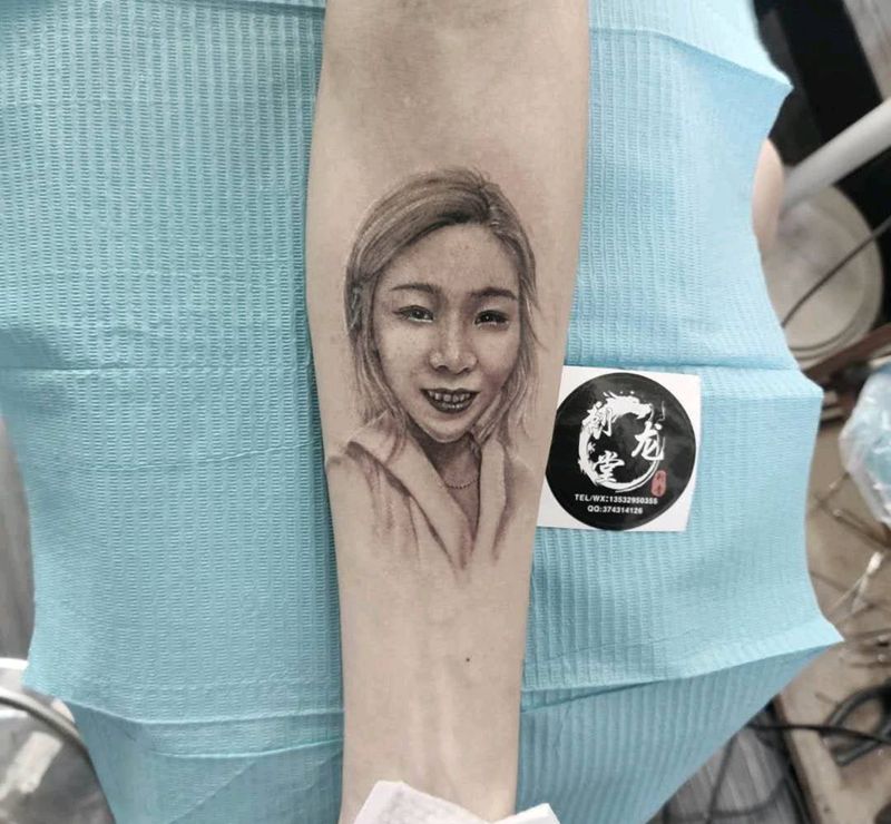 肖像纹身图片_手臂欧美写实纹身图案