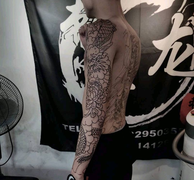 半甲花臂未完成纹身图片_手臂胸部老传统纹身图案