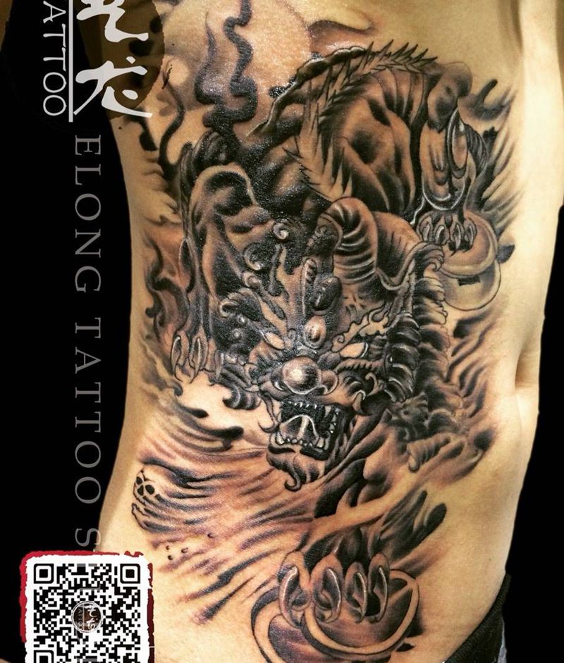 年兽纹身图片_成品腰部传统鬼神纹身图案