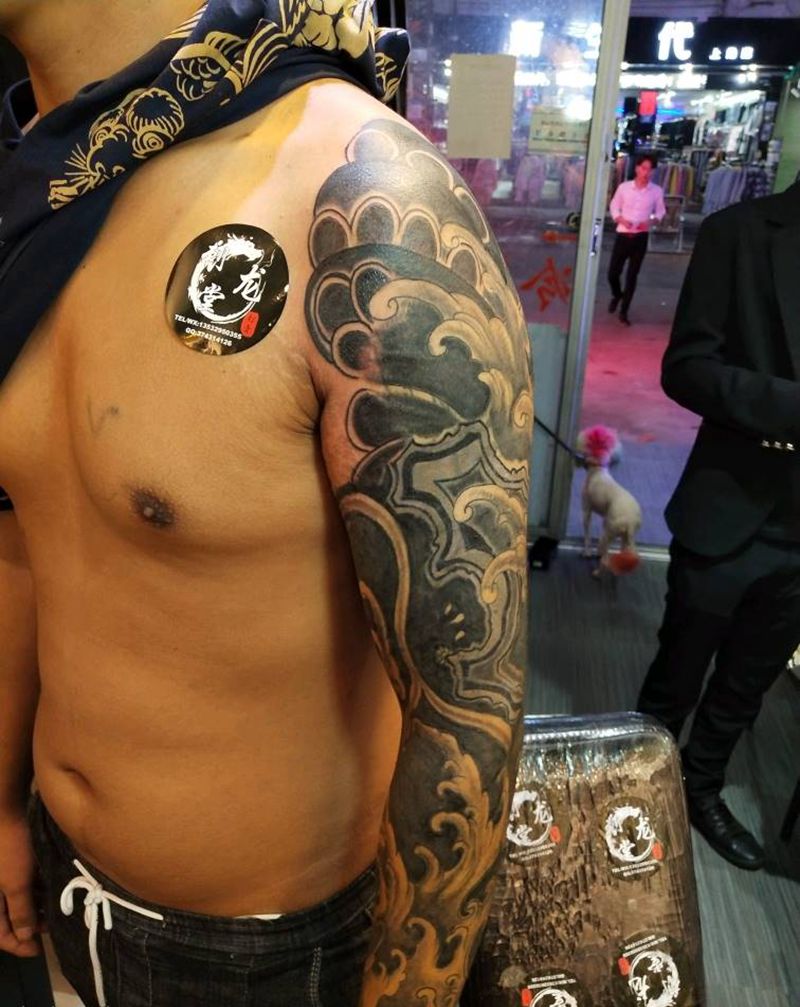 浪花花臂纹身图片