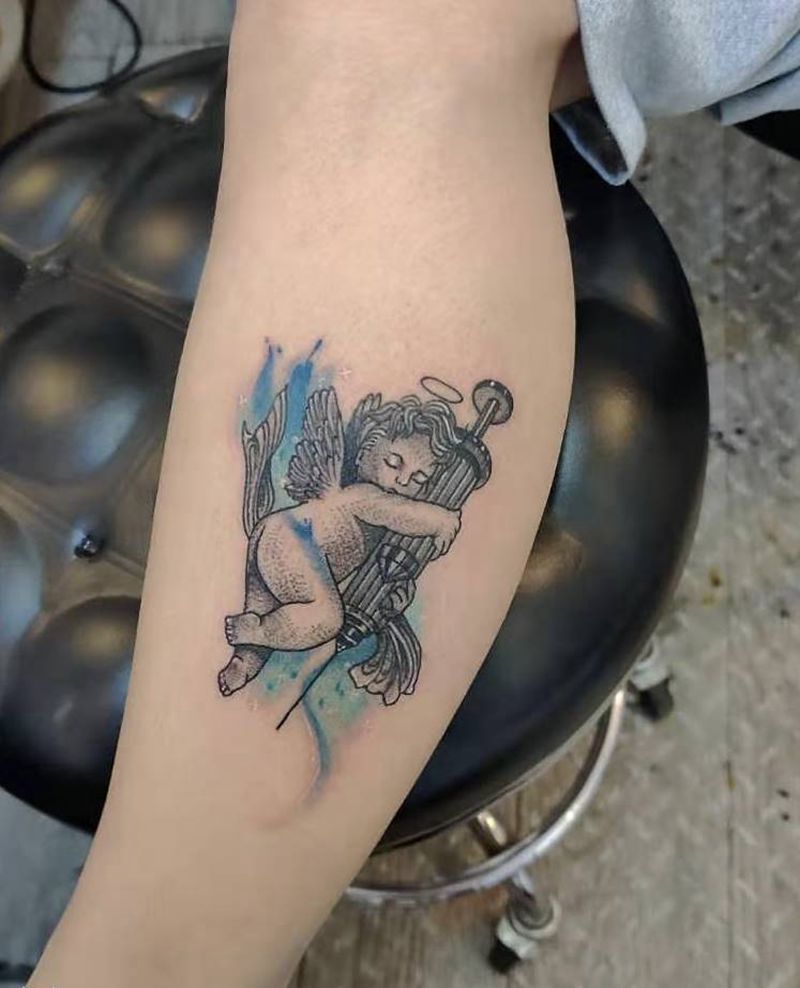 精灵纹身图片_手臂点刺纹身图案