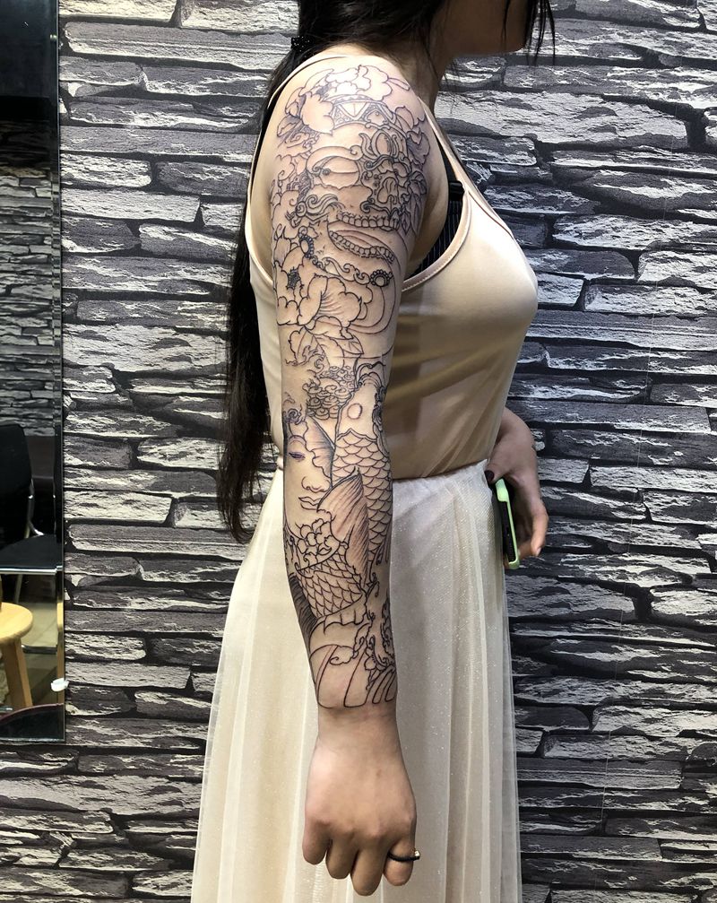 新传统甘巴拉鲤鱼佛纹身图片_手部手臂新传统纹身图案