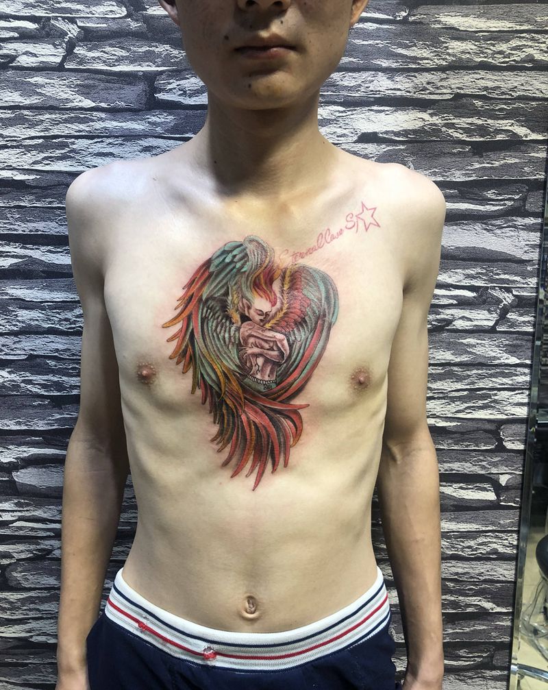 天使之翼纹身图片_胸部水彩纹身图案